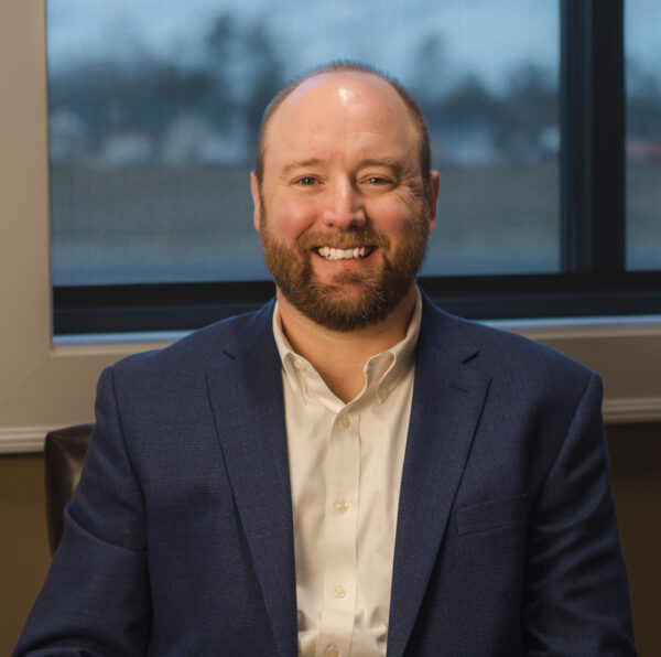 A photo of Chris Miller, CFO of Three Roots Capital